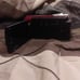 Red and black camcorder that comes with