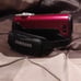 Red and black camcorder that comes with