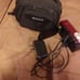 Red and black camcorder that comes with