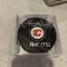 Signed calgary flames hockey puck