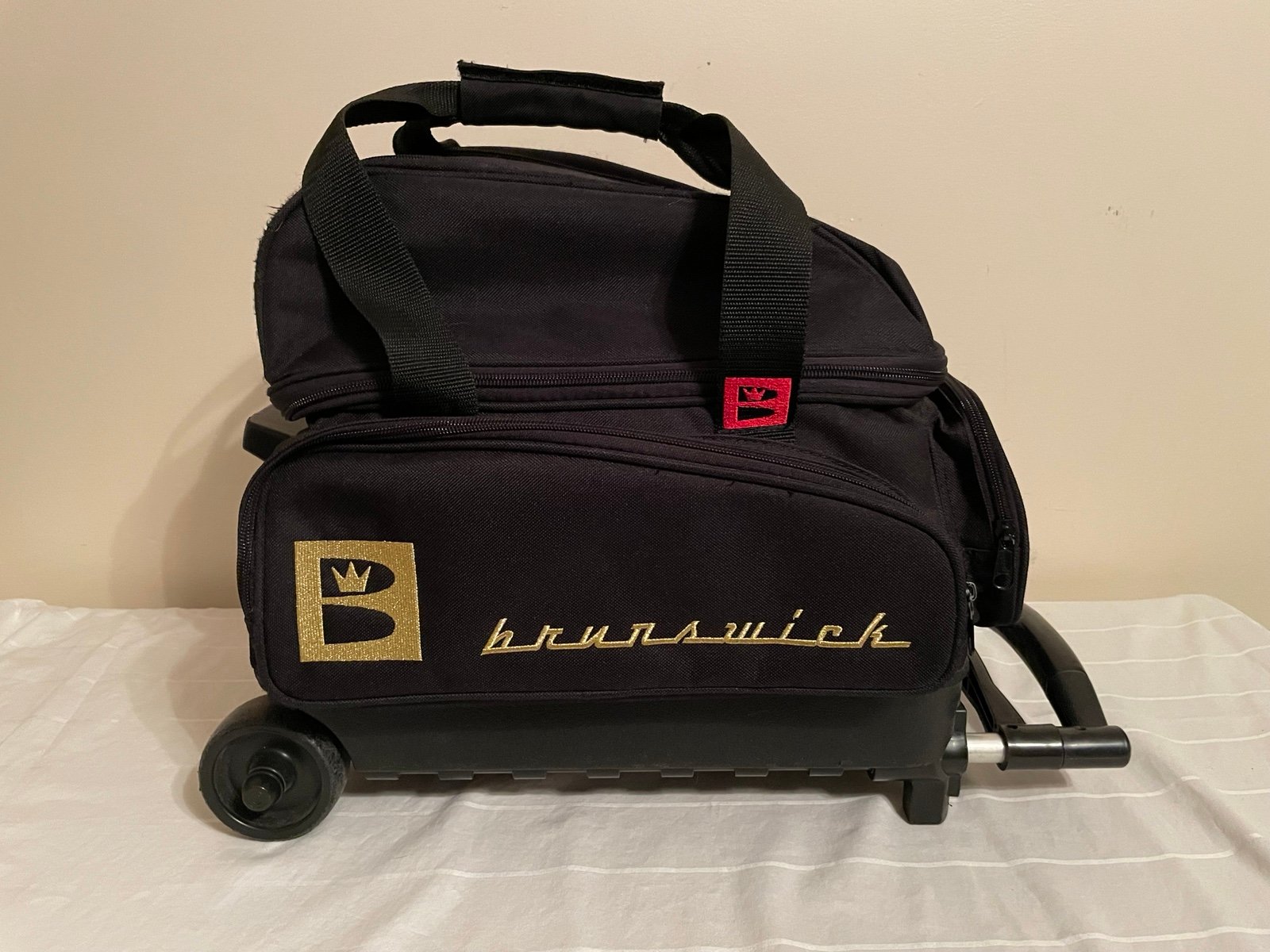 Brunswick 1 Ball Rolling Bowling Bag, Retractable Handle Gold Logo