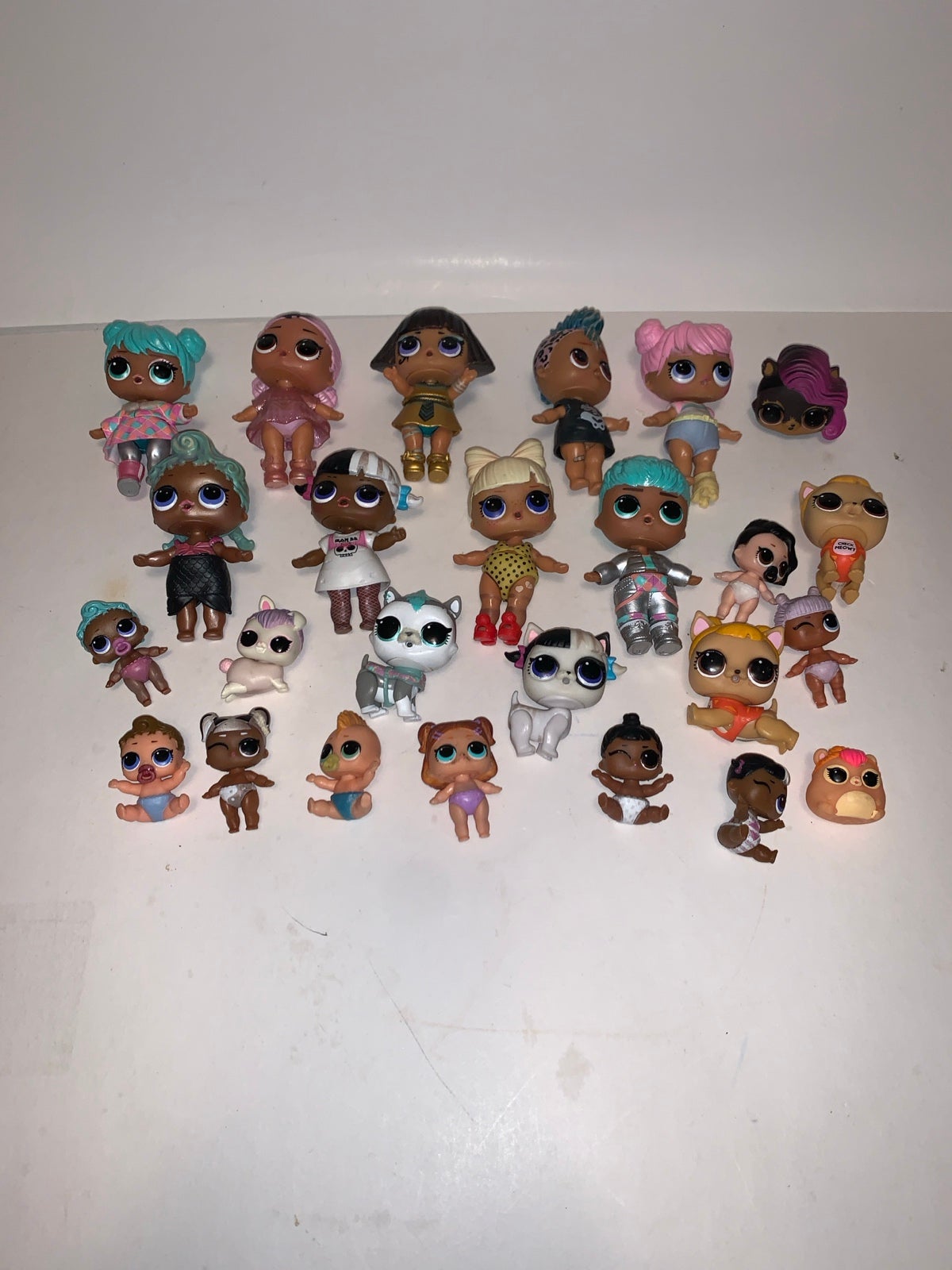 Twenty -Seven LOL Surprise Dolls (Small to Smaller )