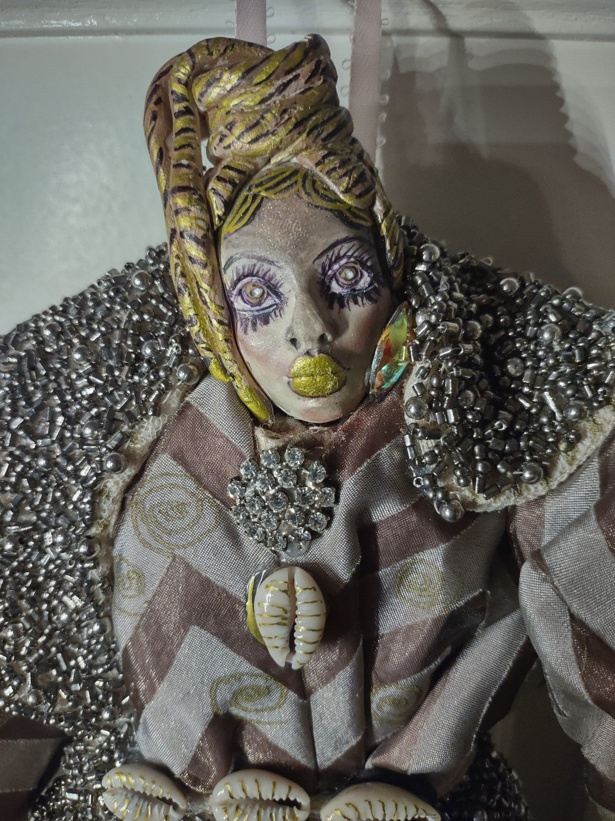 Handmade soft sculpture doll wall hanging