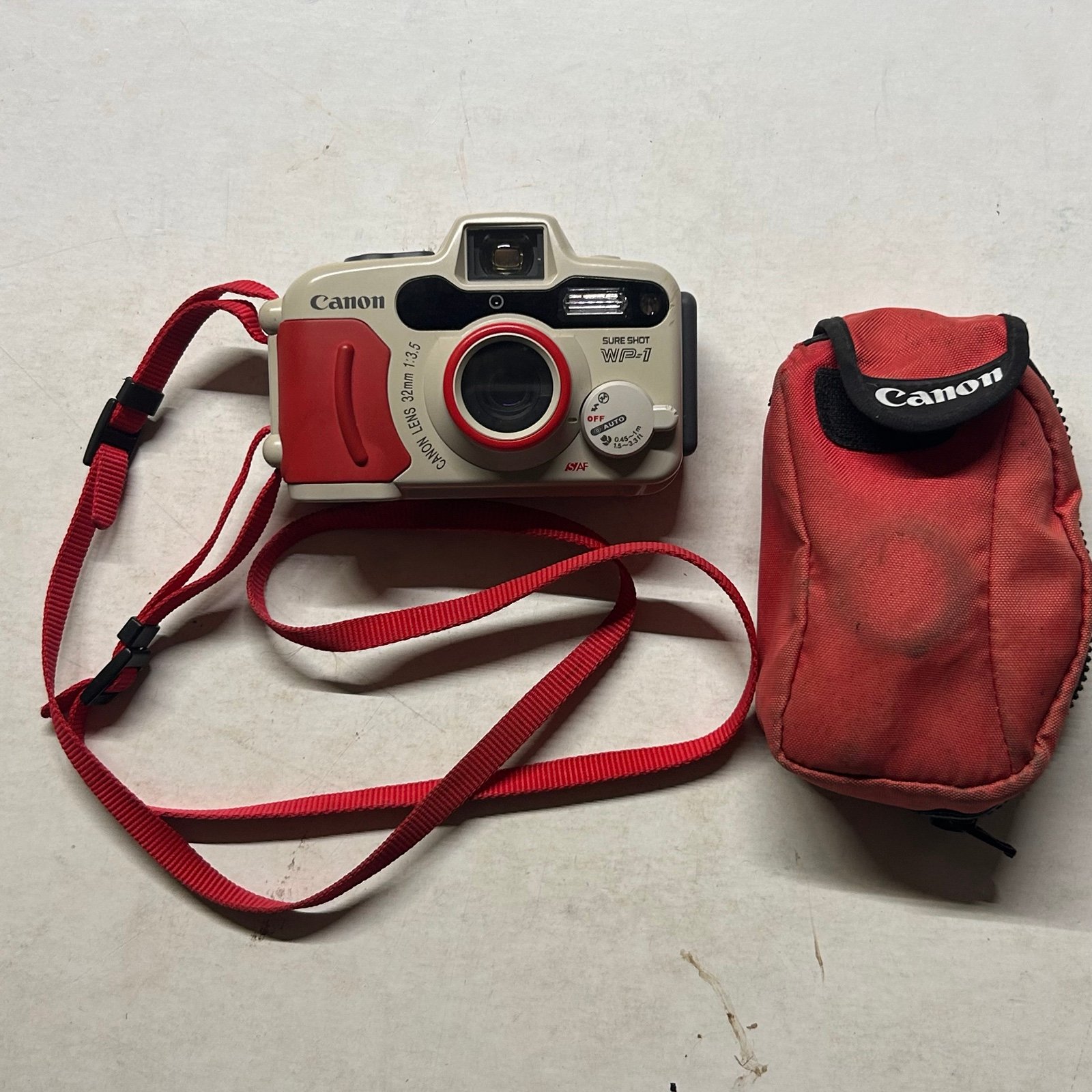 Canon Sure Shot WP-1 Waterproof 35mm Point-and-Shoot Camera w/ Case
