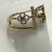 14 k solid yellow gold ring with white CZ