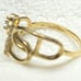 14 k solid yellow gold ring with white CZ