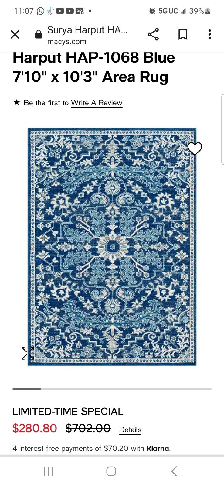 Rectangular 7x10 blue area rug.