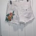 Guess white distressed shorts (size 30)