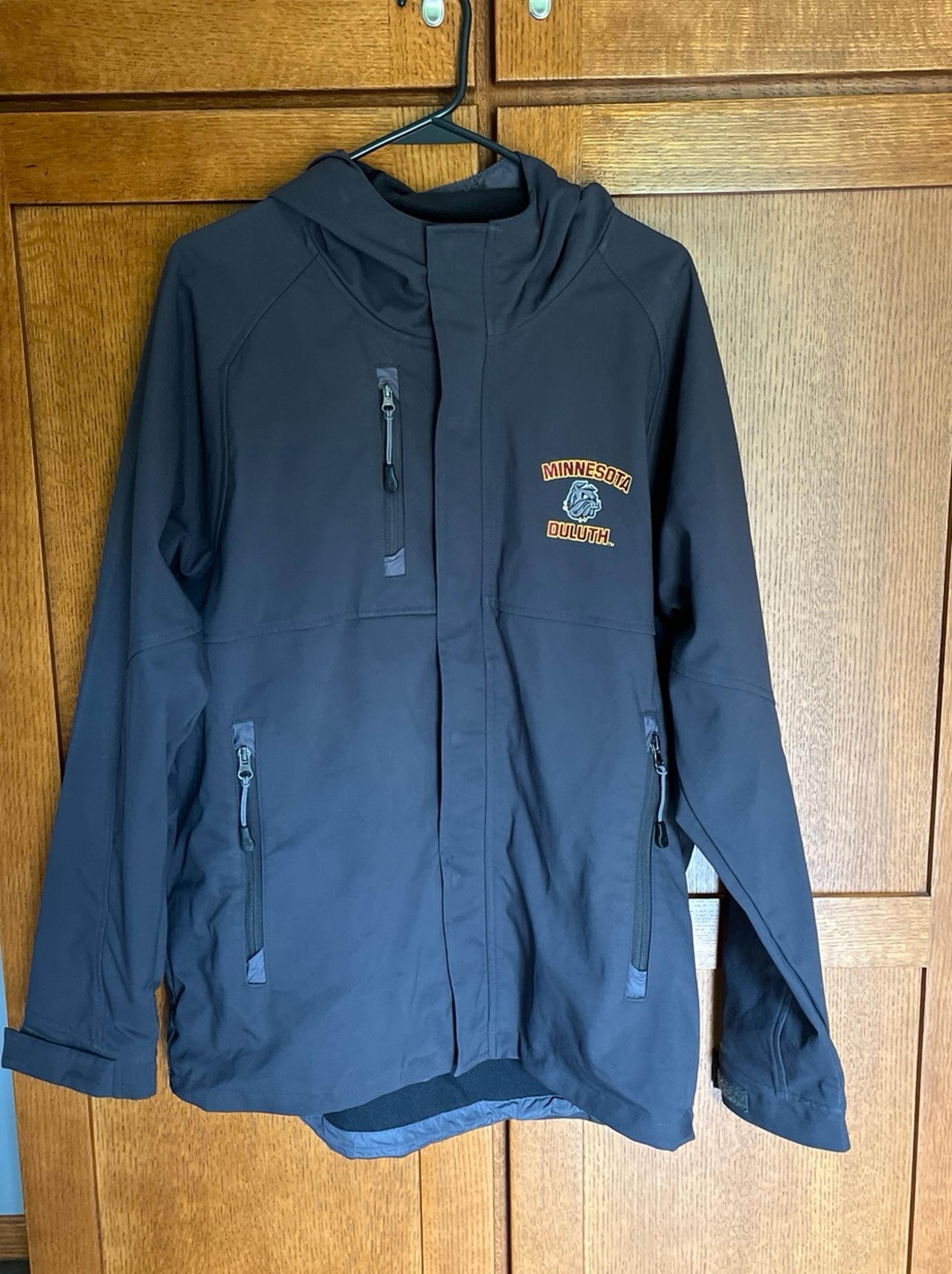 Men’s Under Armor zip up jacket with Minnesota Duluth logo size large