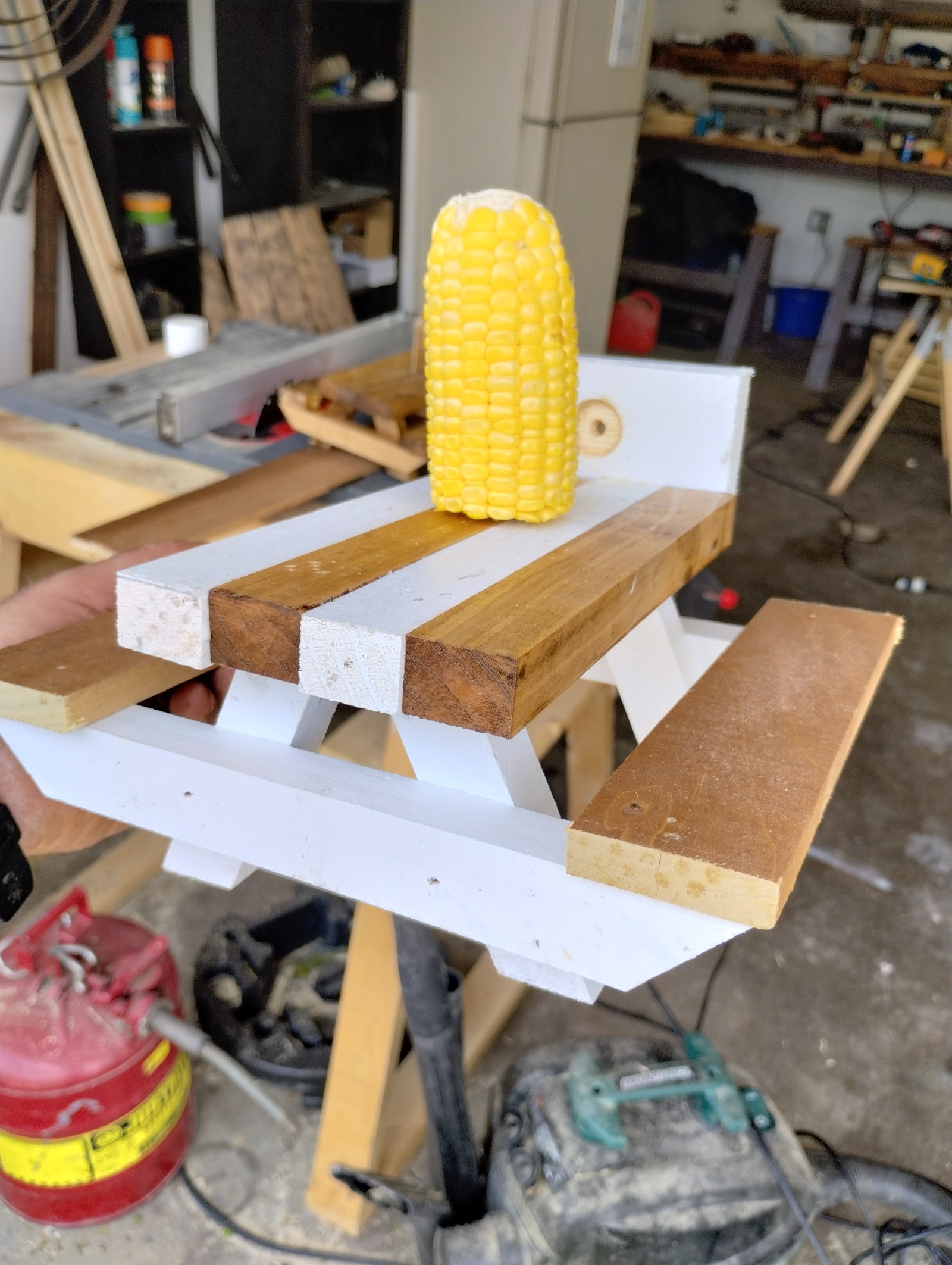 Picnic table squirrel feeders