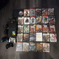 PlayStation 2 console and game lot