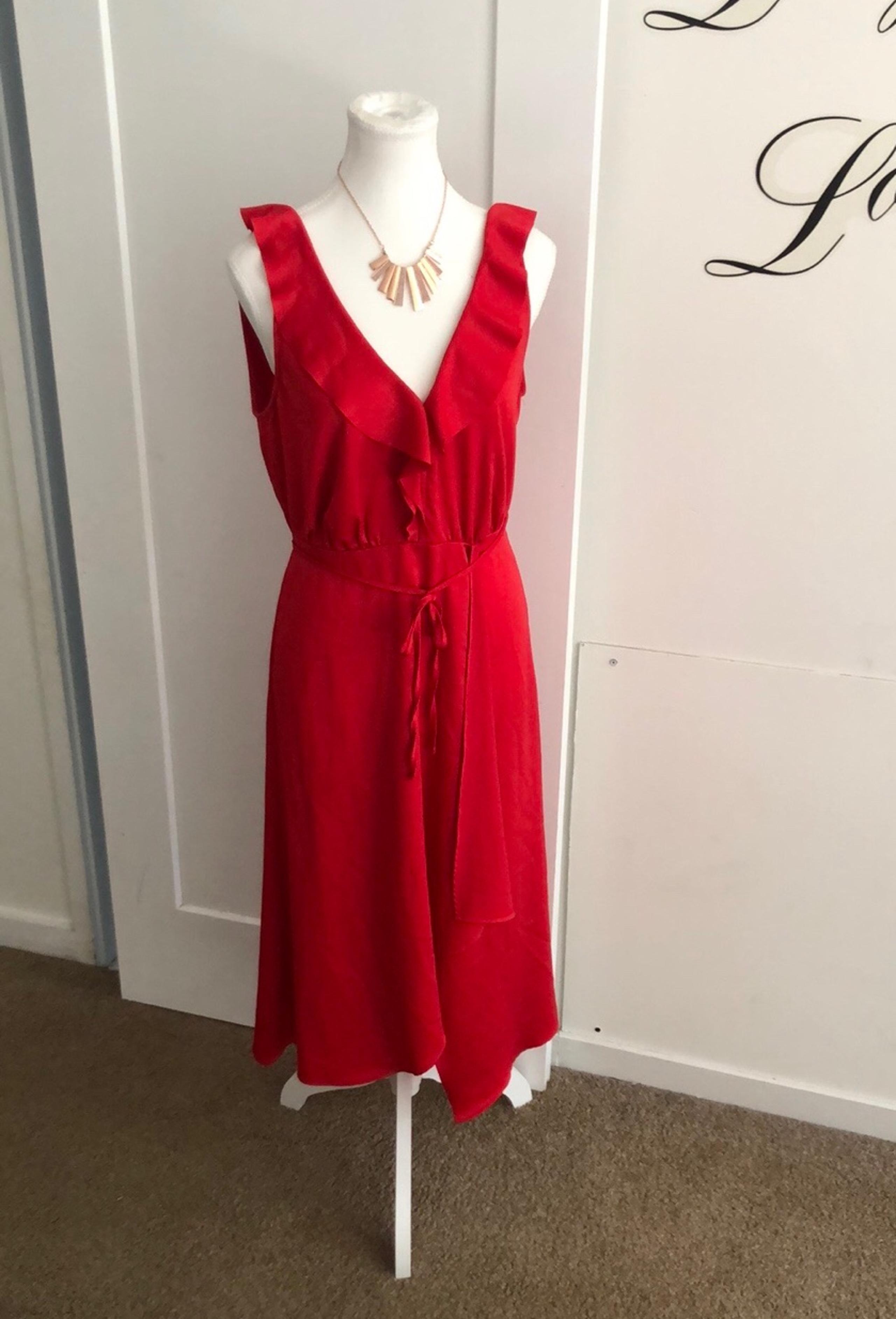 Red French connection faux wrap dress with ruffle detail