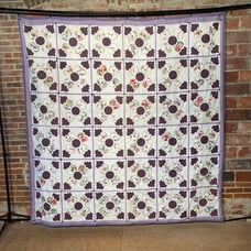 Appliqué Tie Quilt 86” X 87”
