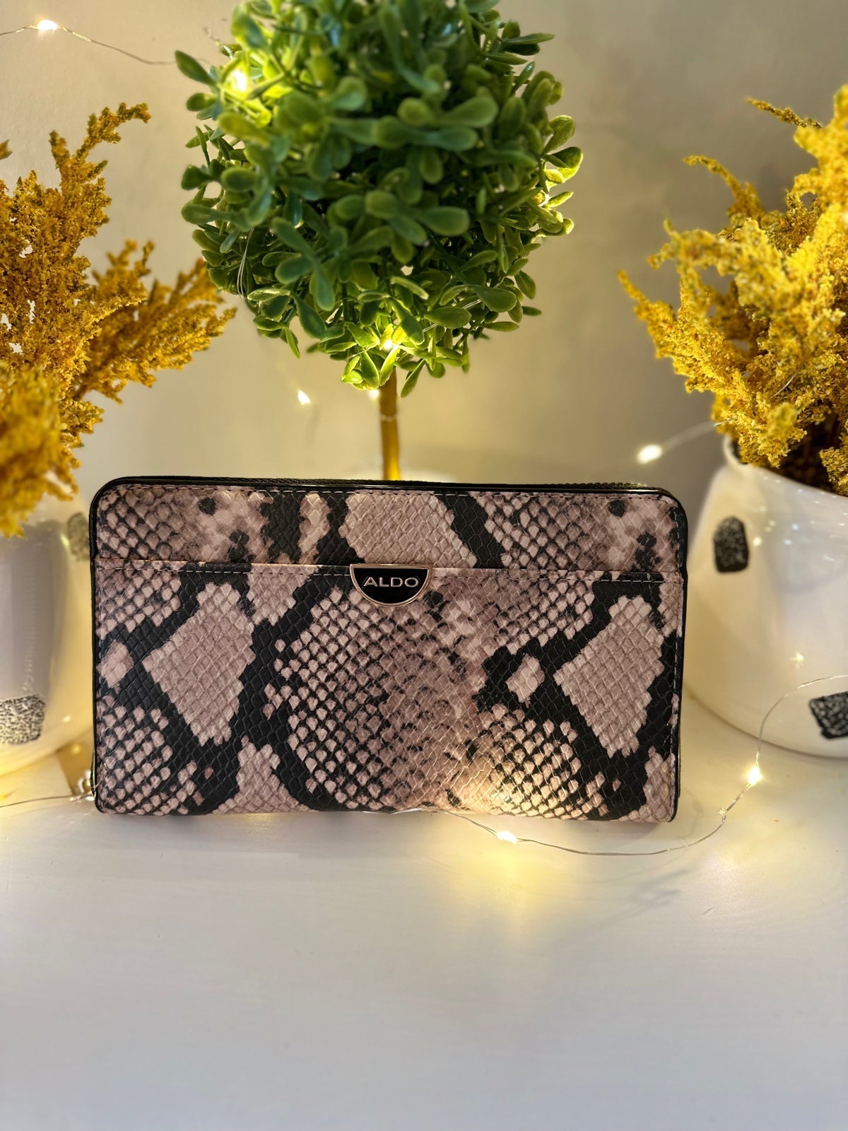 Aldo leopard hotsell clutch