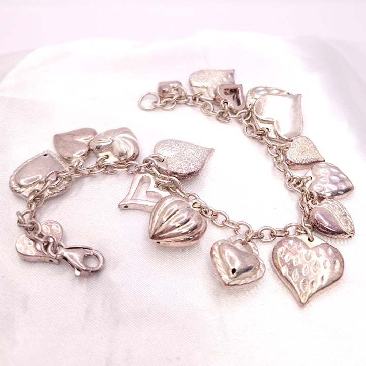 JCM Mauritius Sterling Silver Mixed Heart Charm Bracelet
