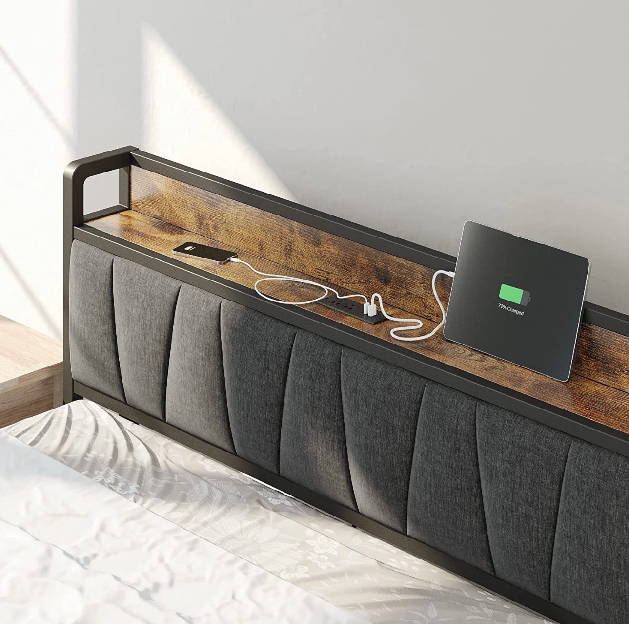 New twin bed with electrical outlet and shelve.