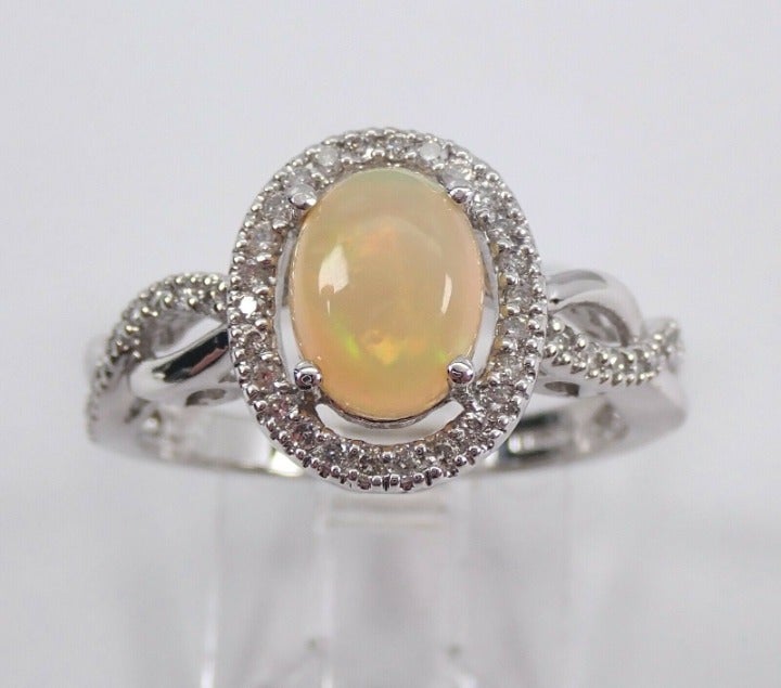 White Gold Opal and Diamond Halo Promise Ring