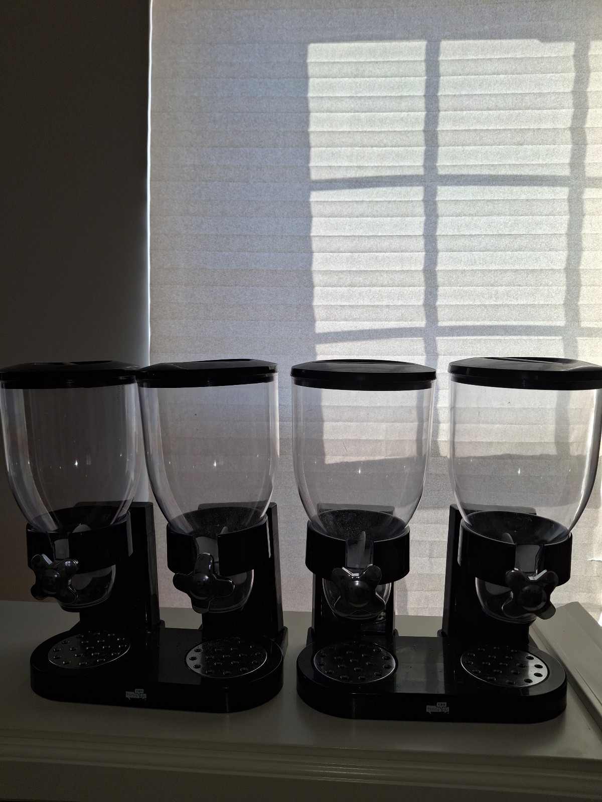 Two sets of double cereal / candy dispensers by Honey Can Do