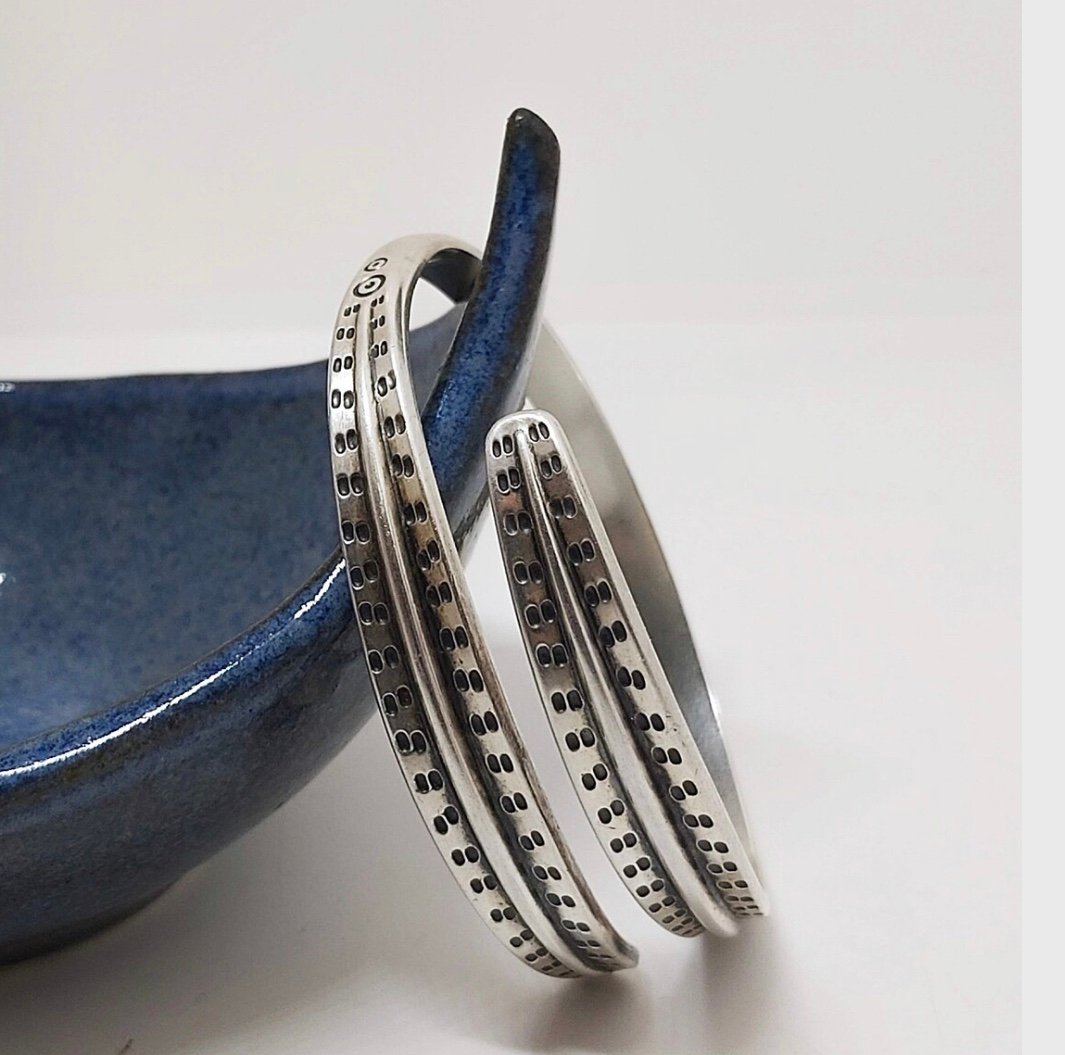 The bangle is marked David-Andersen, NORWAY, sterling and 925s