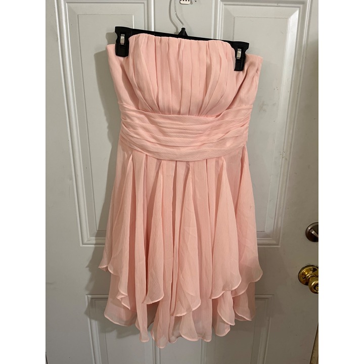 David’s Bridal woman’s strapless flowing pink bridal prom special occasion party