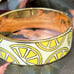 Kate Spade New York gold tone Enamel Lemon Bangle bracelet