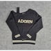NWT INC Women's M Black Varsity Wt Pearl ADORN Asymmetrical Long Sleeve Sweater