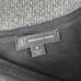 NWT INC Women's M Black Varsity Wt Pearl ADORN Asymmetrical Long Sleeve Sweater