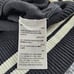 NWT INC Women's M Black Varsity Wt Pearl ADORN Asymmetrical Long Sleeve Sweater