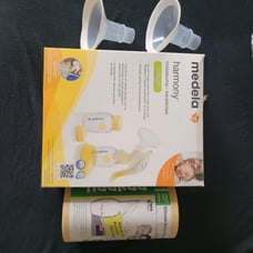 Medela harmony breastpump and extra attachments and Haakaa silicone pump