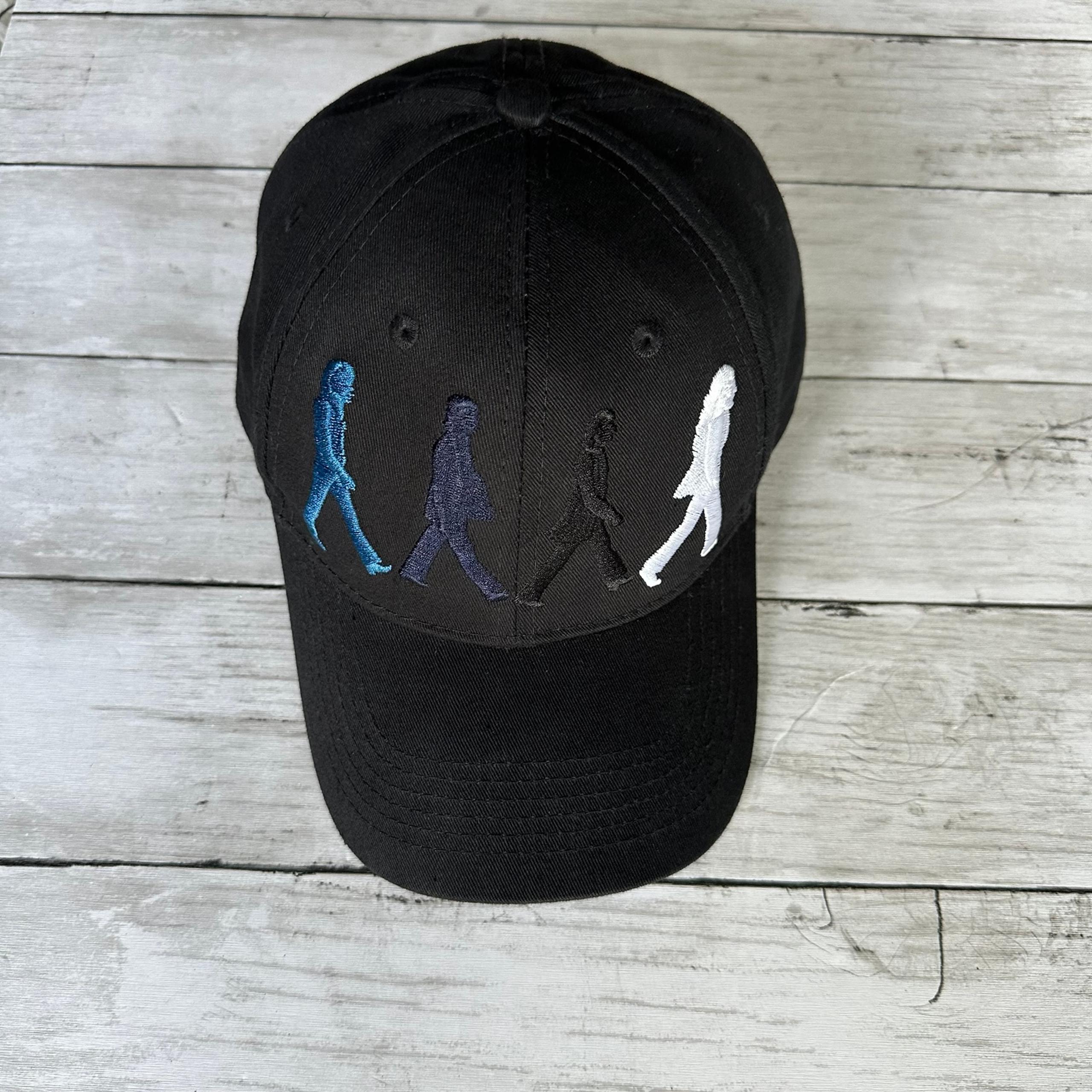 PREOWNED THE BEATLES BLACK BLUE WALKING ACROSS STREET HAT ONE SIZE ABBEY ROAD