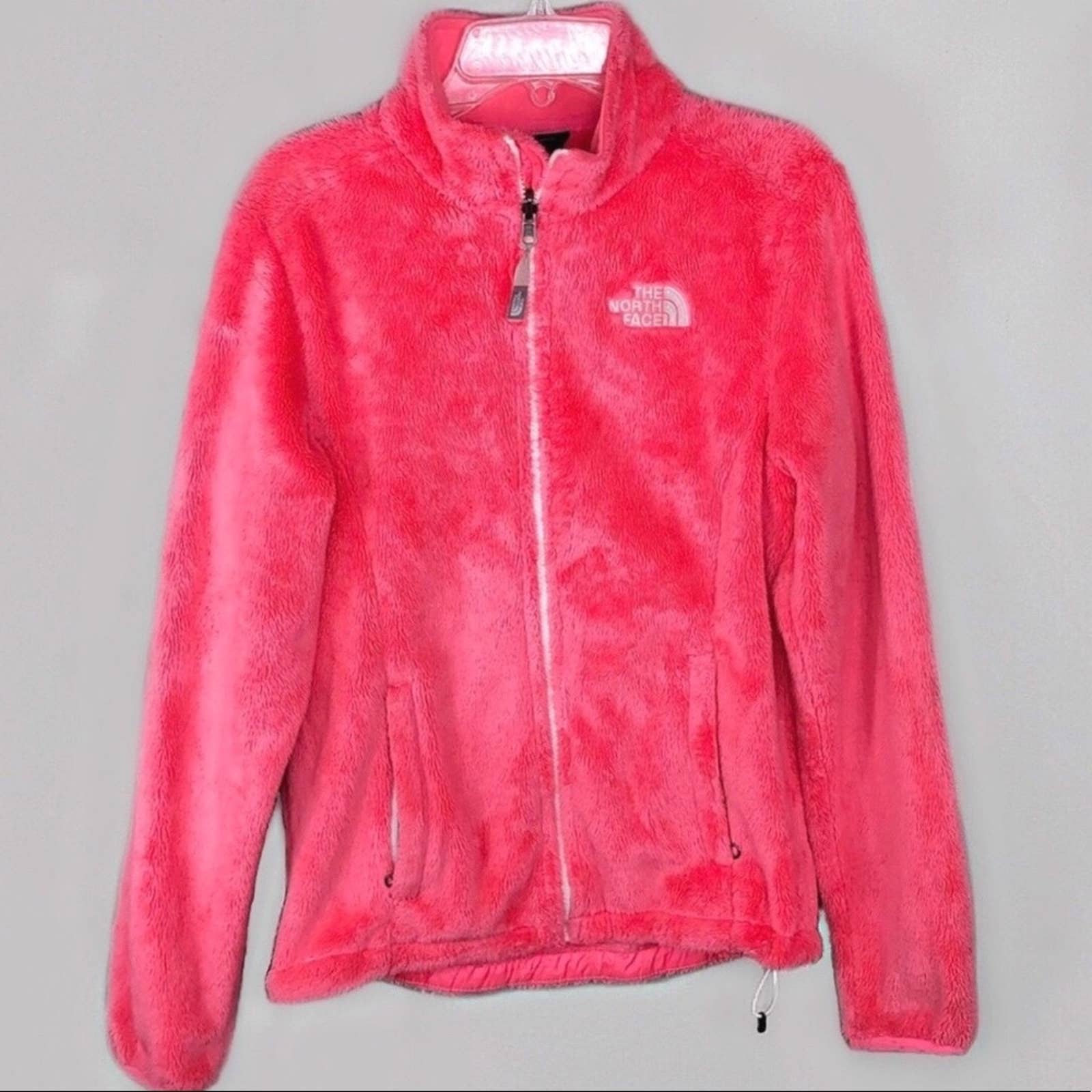 hot pink fuzzy north face jacket