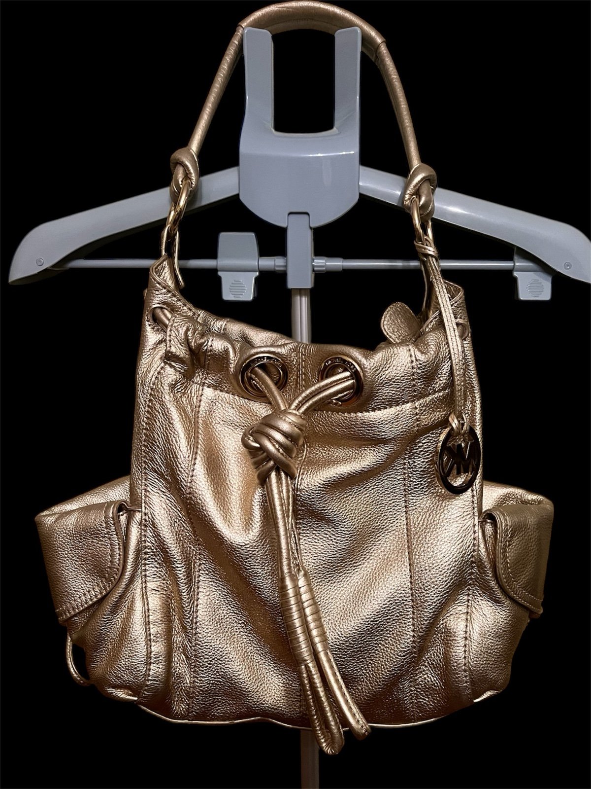 Michael Kors Metallic Gold Leather Drawstring Shoulder Bag.