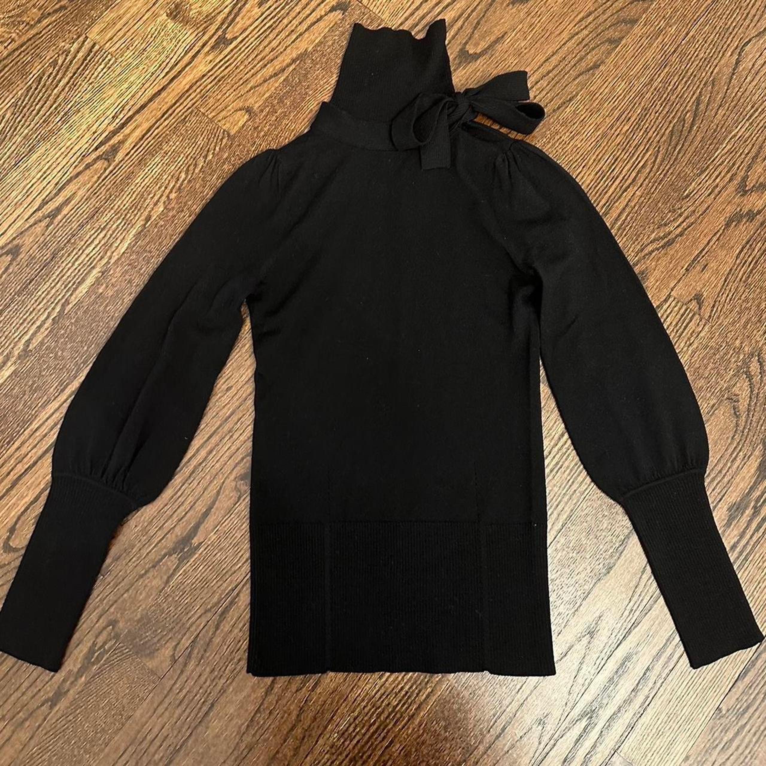 Diane von Fursternverg bow tie turtleneck