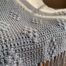 Handmade crochet lap throw