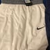 Numerous pairs of Nike shorts different