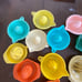 Vintage Plastic Manual Juicer Multicolor Reamer Farmhouse Kitchenware Lot of 17