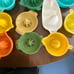 Vintage Plastic Manual Juicer Multicolor Reamer Farmhouse Kitchenware Lot of 17