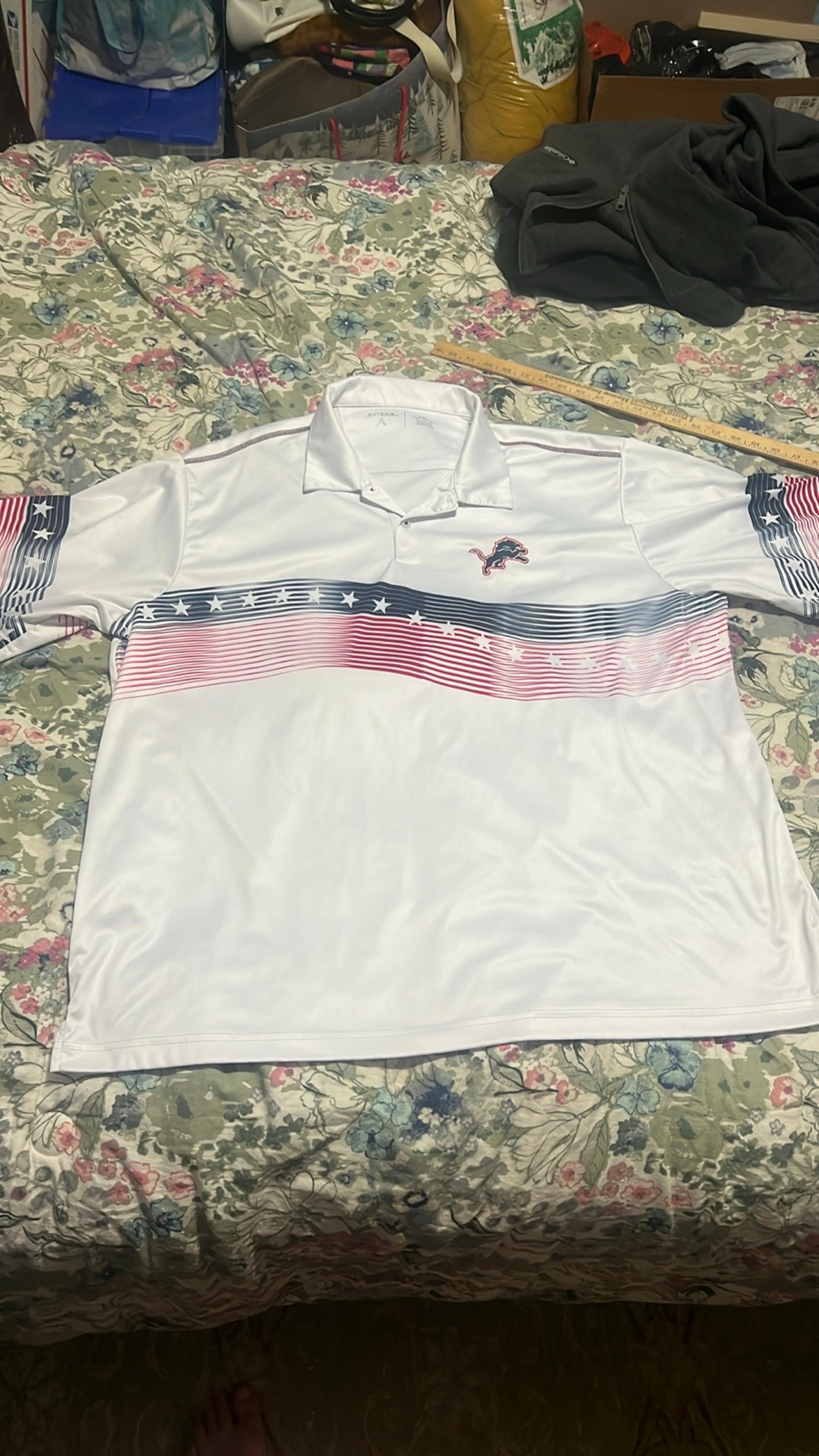 Antigua men’s lions polo