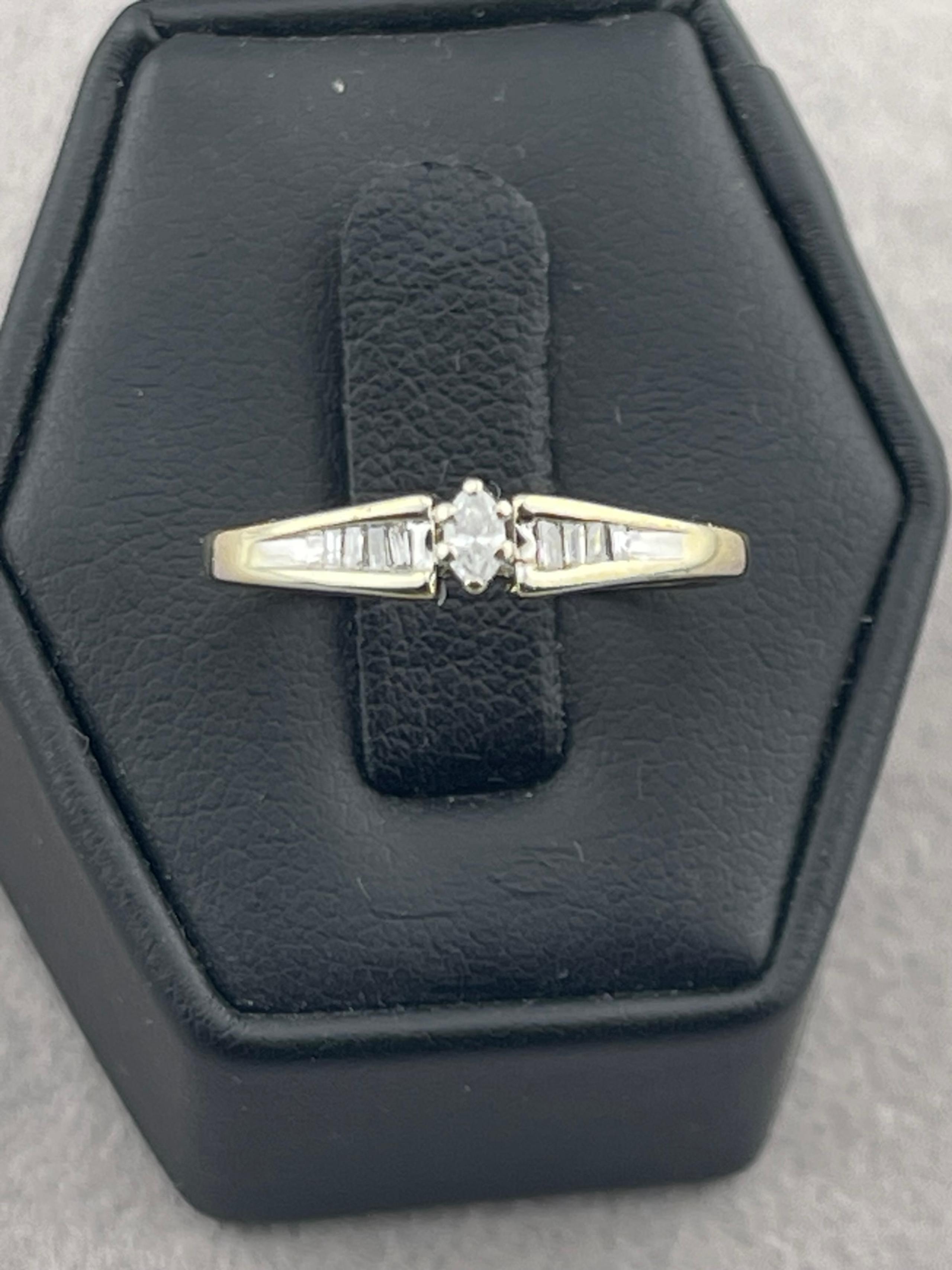 Modern quarter carat diamond promising 14 karat yellow gold