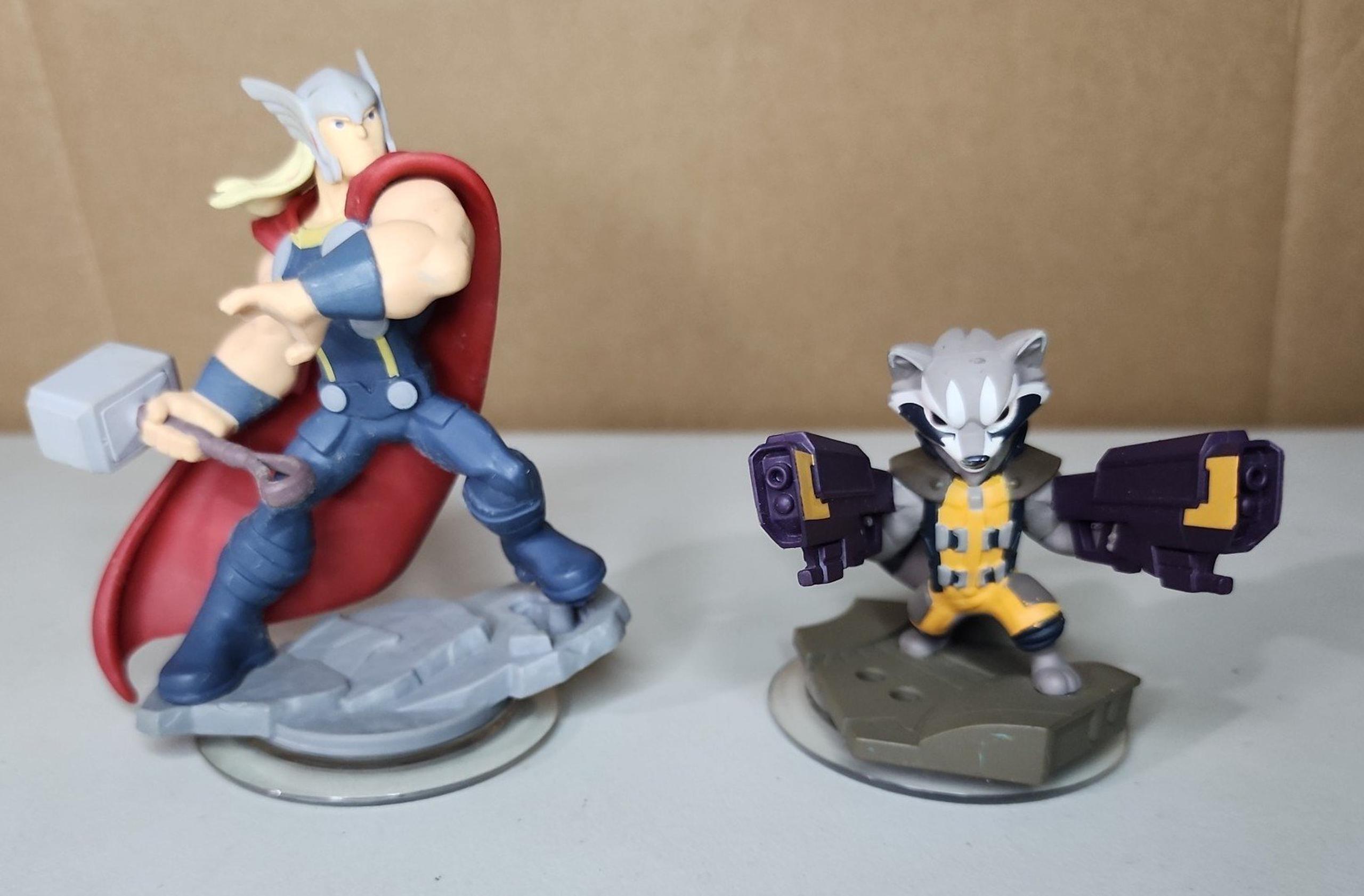 (2) Disney Infinity 2.0 AVENGERS Figurines of THE MIGHTY THOR and ROCKET RACCOON