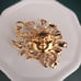 Kirks Folly Sun Brooch with Aurora Borealis Crystals Gold Tone 1.75 inch Wide