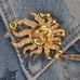 Kirks Folly Sun Brooch with Aurora Borealis Crystals Gold Tone 1.75 inch Wide