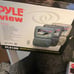 Pyleview adjustable headrest with built in monitor