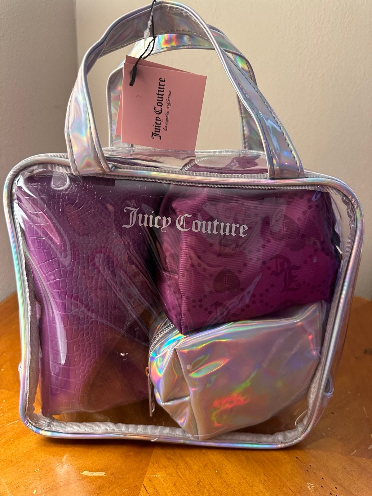 Juicy Couture 4 piece cosmetic bags
