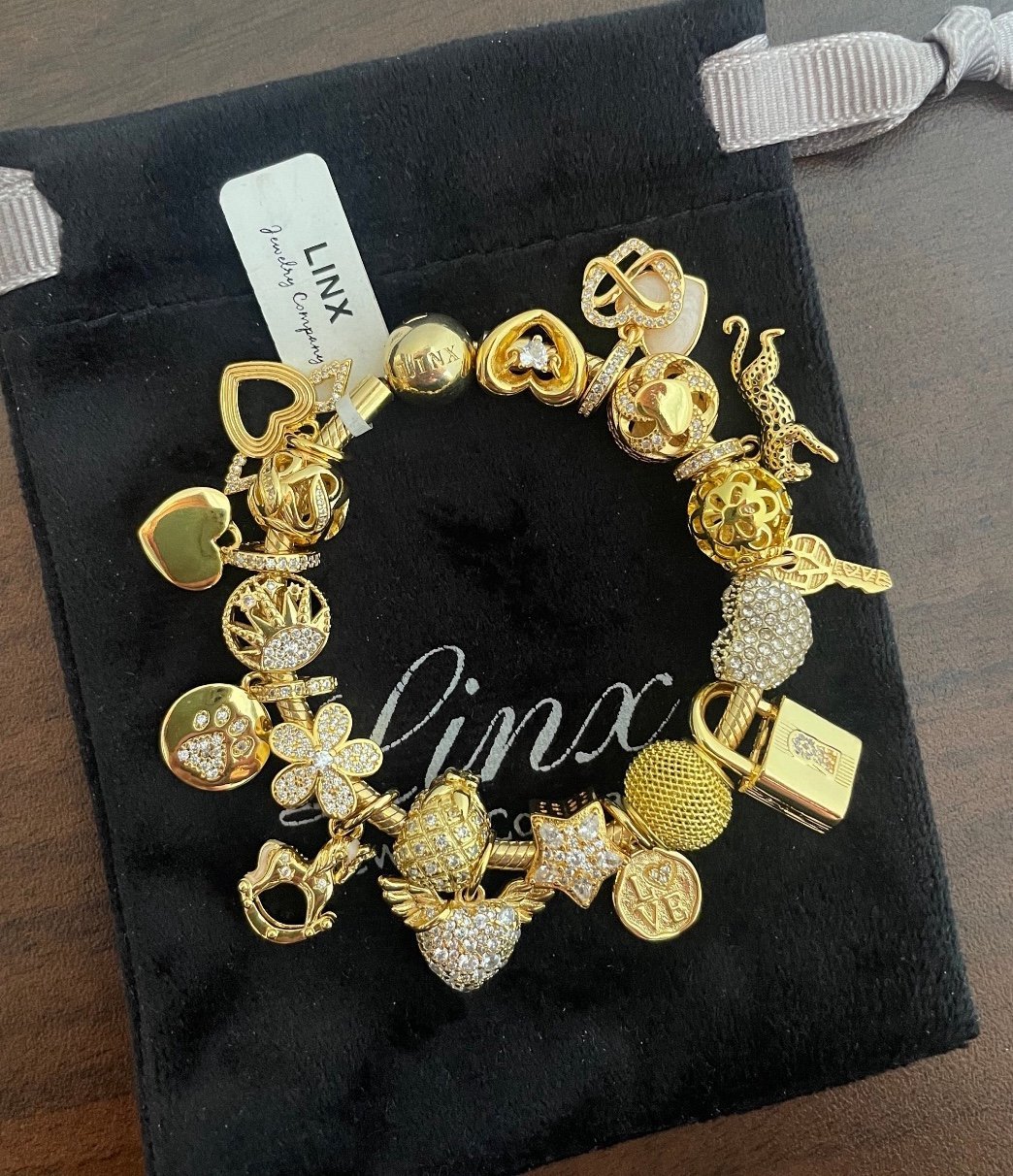 Linx Yellow Gold Snake Chain Bracelet with Gold Charms