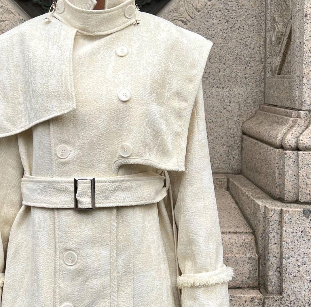 AÉRMA Layered Panel Pleated Long Coat