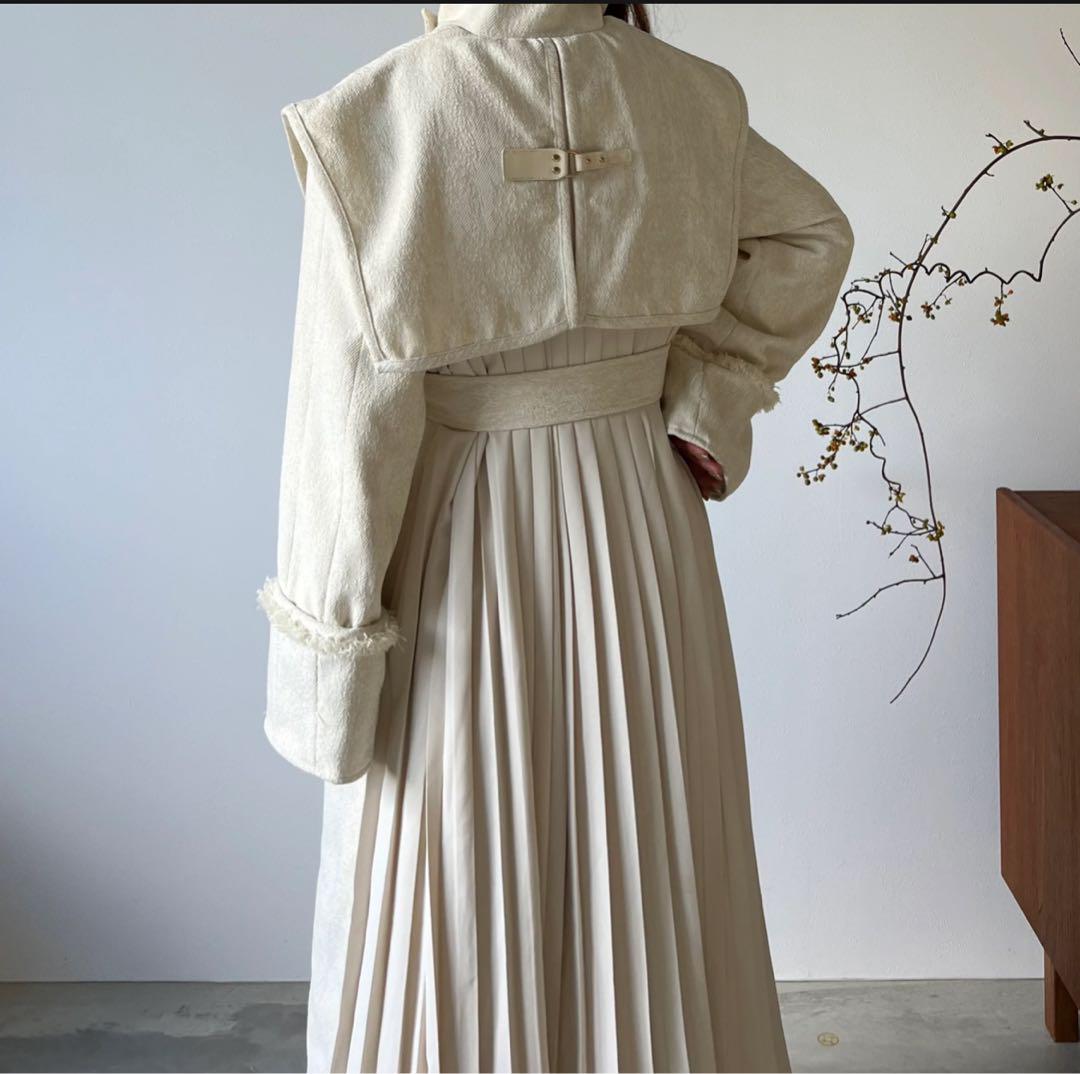 AÉRMA Layered Panel Pleated Long Coat