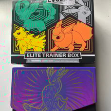 OPENED Elite Trainer boxes Evolving Skies and Violet