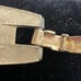 Signed vintage 1950s gold tone LISNER bracelet w/ red faux rubies 7” by 3/4”