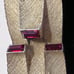 Signed vintage 1950s gold tone LISNER bracelet w/ red faux rubies 7” by 3/4”